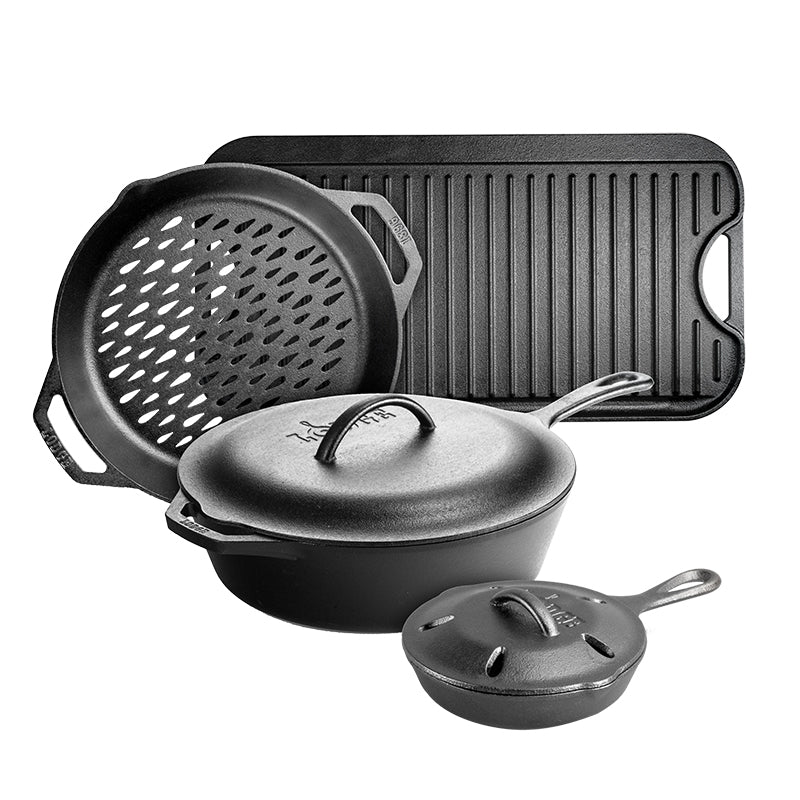 Set of black cast iron cookware including a grill pan, grill topper, covered deep skillet, and smoker skillet.