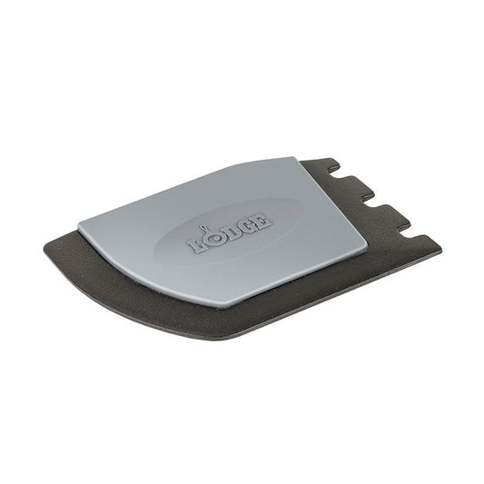 Black and gray scraper with one smooth side for flat surfaces and one serrated side for grill pans.