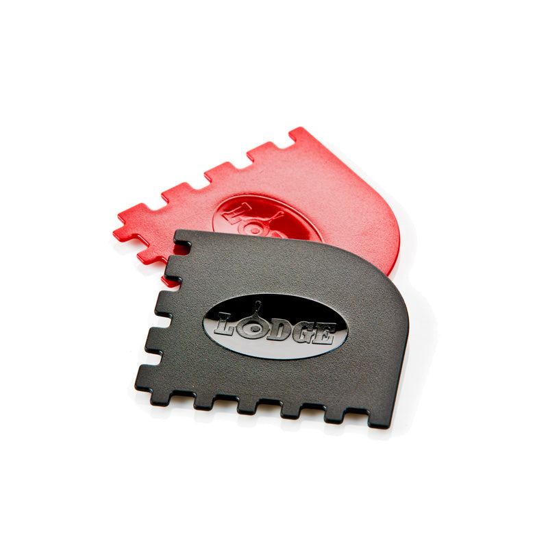 Two grill pan scrapers, one black and one red, with a white background.