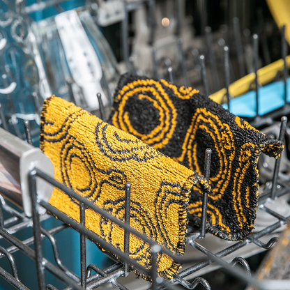 Scrub cloth's in dishwasher.