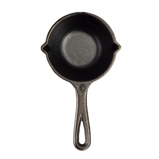 Top view of melting pot that has one long handle and 2 pour spouts.