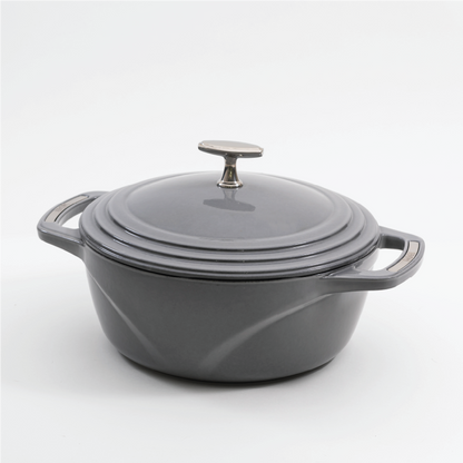 Grey enameled cast iron Dutch oven with a lid on a white background