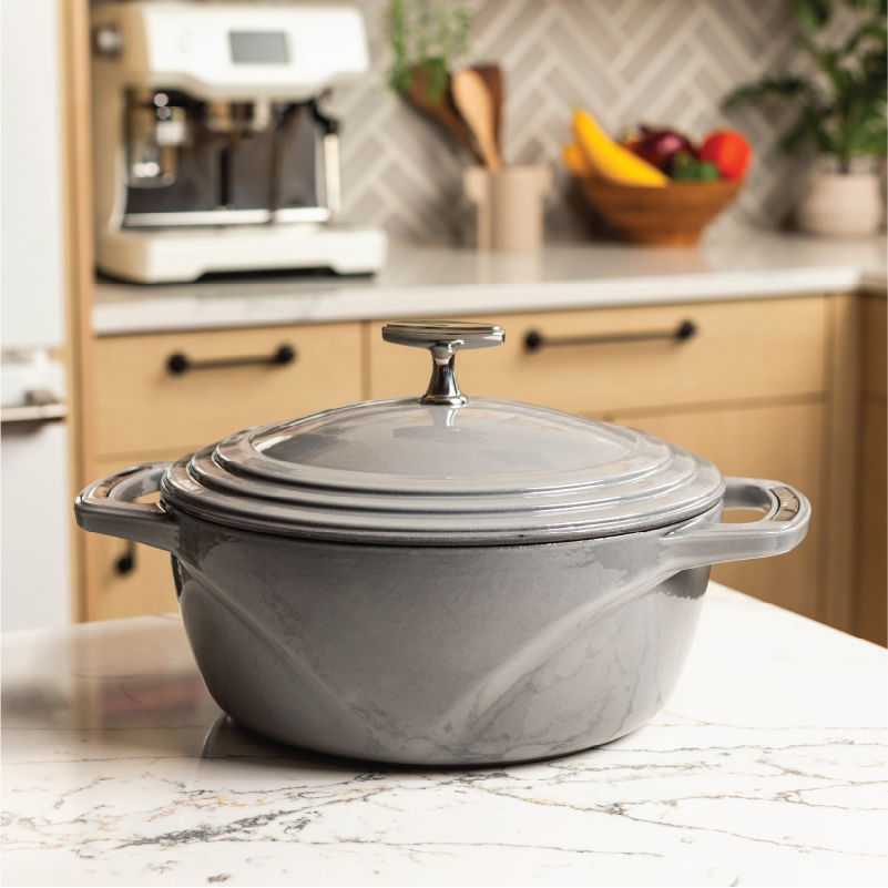Grey dutch oven on kitchen countertop.