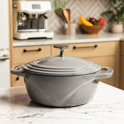 Grey dutch oven on kitchen countertop.