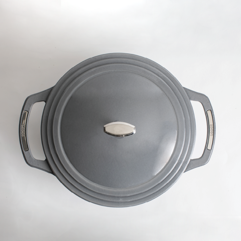 Top view of grey dutch oven featuring silver knob on lid and silver accents on handles.