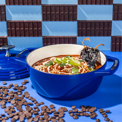 Freshly made hot chocolate chili surrounded by chocolate.