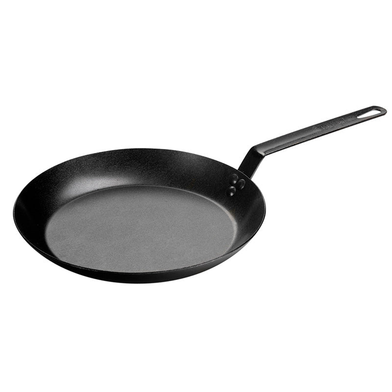 Black skillet with long straight handle.