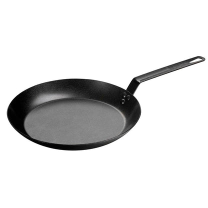 Black skillet with long straight handle.