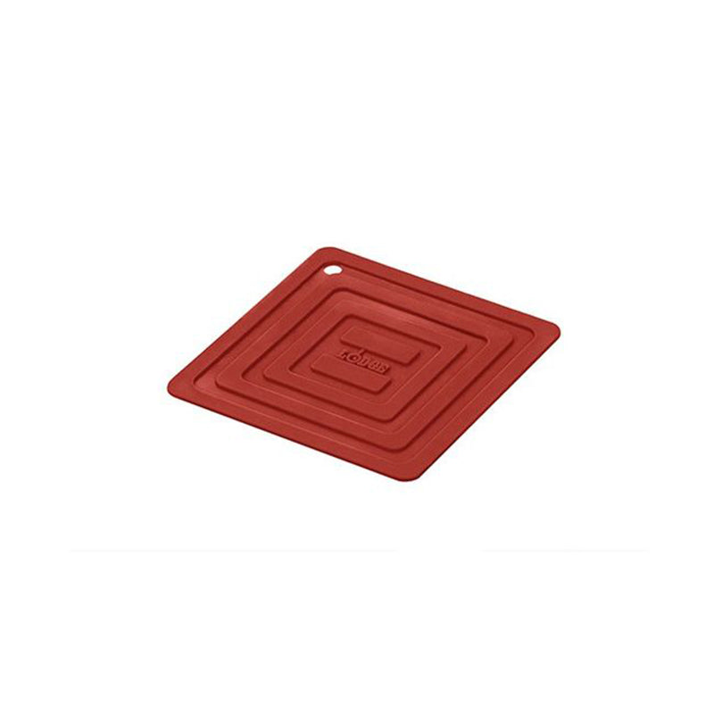 A red square silicone pot holder, with nested square indentations.