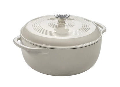 Oyster white enameled cast iron Dutch oven with lid on a white background