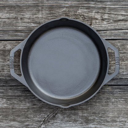 Top view of pan on wooden background.