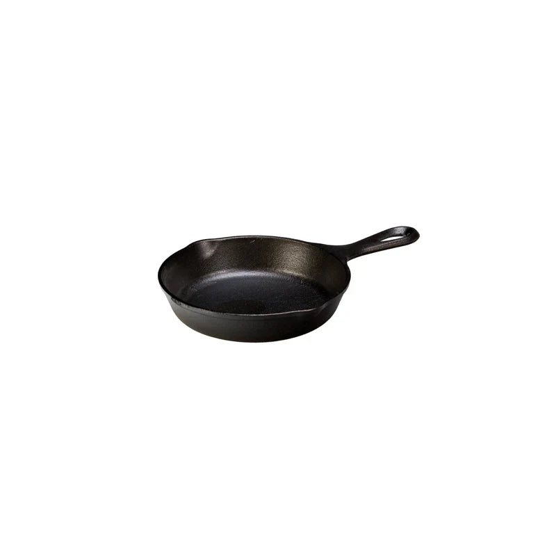 Black skillet with long handle and 2 pour spouts.
