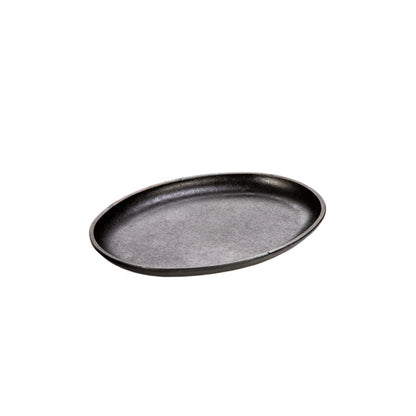 An oval-shaped, black-colored serving griddle with no handles.