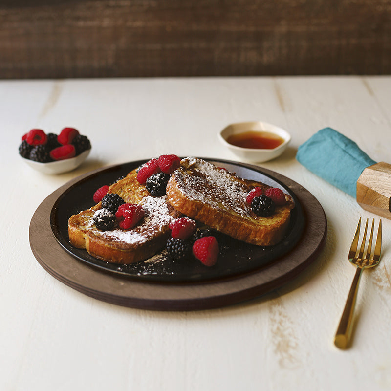 French toast served on table with griddle and underliner.