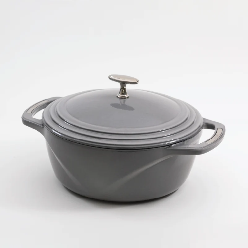 Grey enameled cast iron Dutch oven with a lid on a white background