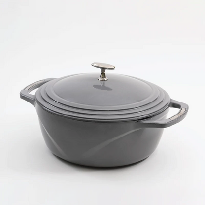Grey enameled cast iron Dutch oven with a lid on a white background