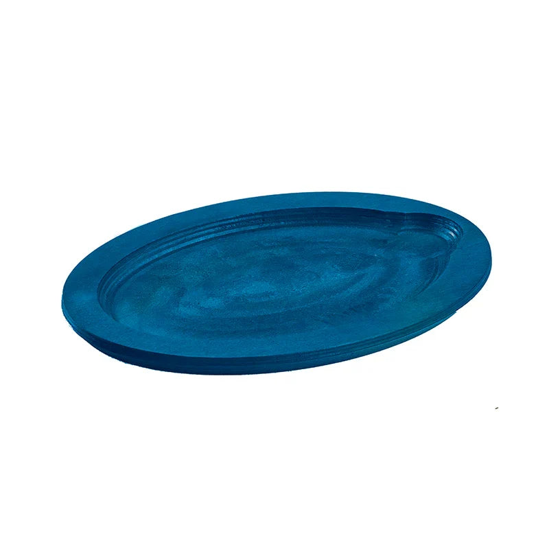 Blue colored wood underliner with indent to place serving dish.